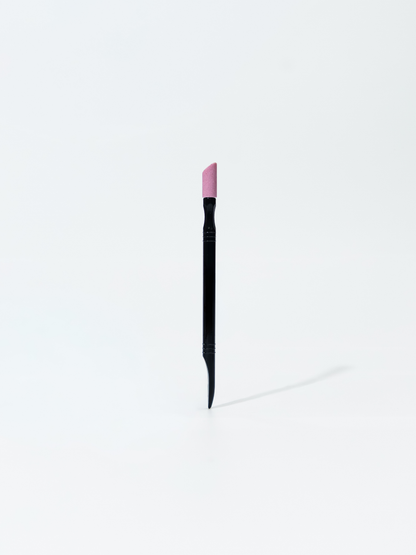 Plastic pusher with pumice stone for uncut manicure